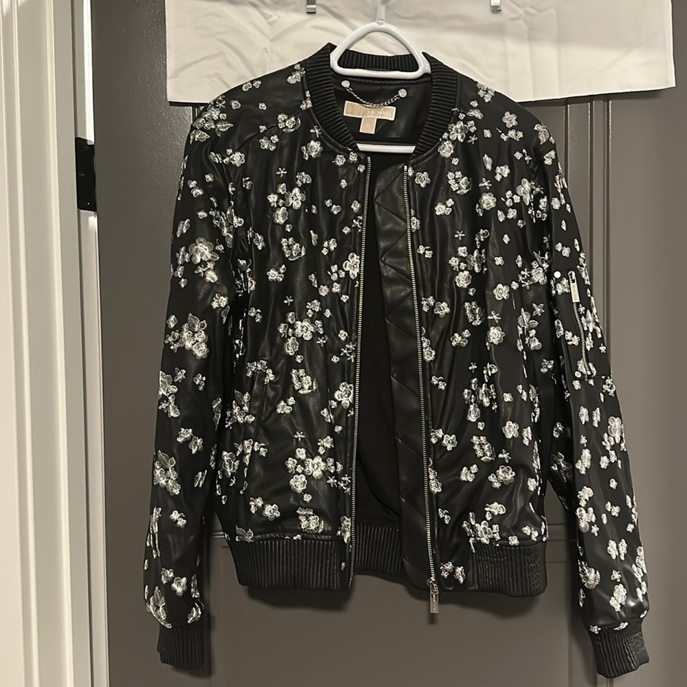 Black bomber jacket.  Only worn twice, excellent condition.